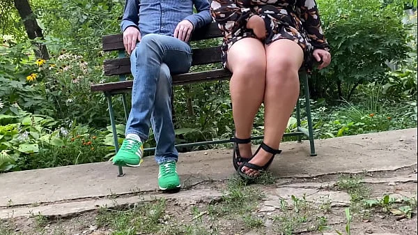 MILF pissing with her legs spread wide I get excited and look